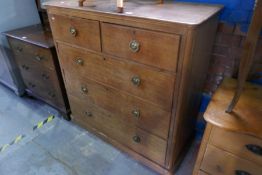 A large mahogany chest of 2 short above 3 long drawers