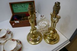 A pair of heavy weighted brass naval ship lamps construction from bulkheads, marked AP909 - history