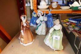 A quantity of Doulton figures including Grand Manner