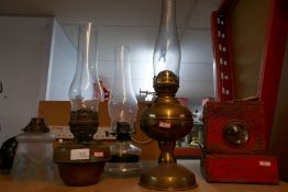 A selection of various oil lamps etc