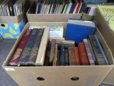 A box containing antique children's novels including Rudyard Kipling and Punch annuals