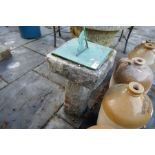 Weathered stone effect garden sundial with copper dial