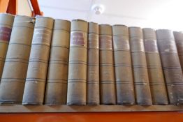 Large shelf of leather bound Law volumes including The Times Law Reports