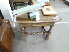 A period oak side table with single drawer on turned supports 75cm x 54cm with later repair to top