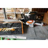 Petrol Stihl hedge trimmer and hand attachment
