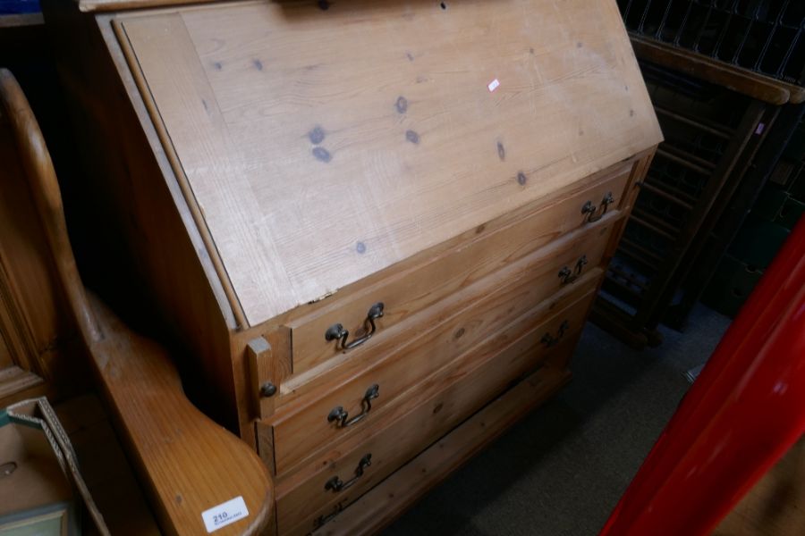 A waxed pine bureau with four drawers