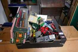 A box of diecast vehicles to include Corgi, etc