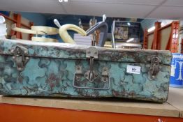 Small old steel suitcase
