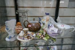 A shelf of 19th century and later pottery and glassware to include an old Derby candle holder