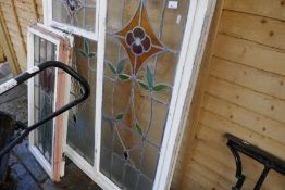 Collection of vintage stained glass windows and a pair of iron trestles AF