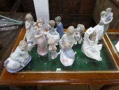 9 Nao figurines to include children and Lovers