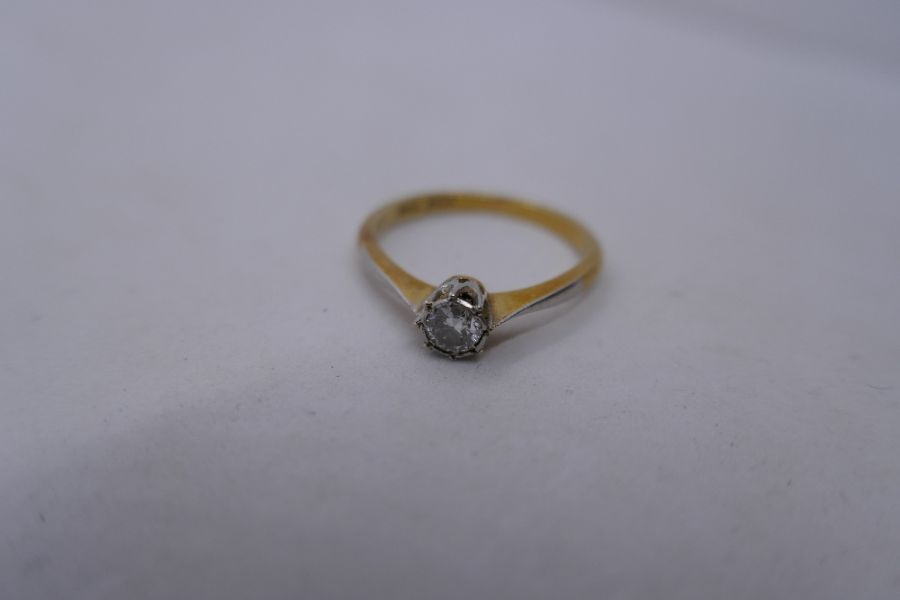 18ct yellow gold solitaire diamond ring set in platinum mount, approx 0.20carat, claw setting marked