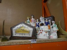 Staffordshire figurines, art deco mantle clock, pair of brass bookends in the form of ladies’ shoes