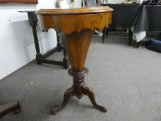 A Victorian inlaid walnut trumpet sewing table with floral decoration