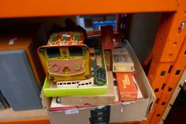 A set of vintage toys including tin plate toys, dinky cars and railway models