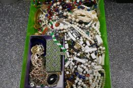 Box of costume jewellery to include necklaces, silver and amber bracelet. Silver and Peridot example
