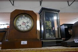 A mahogany cased mantle clock and 1930's oak example and two other clock cases