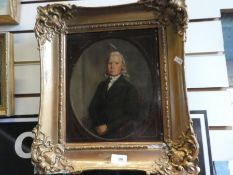 A 19th century portrait of seated man on card unsigned 25.5x29.5cm