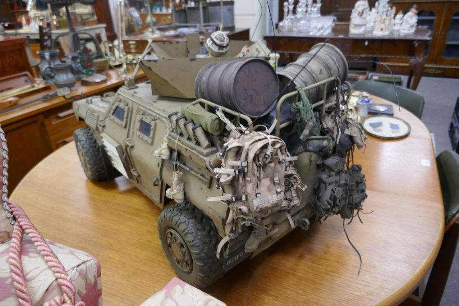 A remote control model of a British armoured vehicle modelled on Gulf War set up (highly de - Image 6 of 7