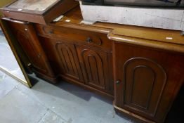 A Victorian mahogany mirror back sideboard, having central drawer