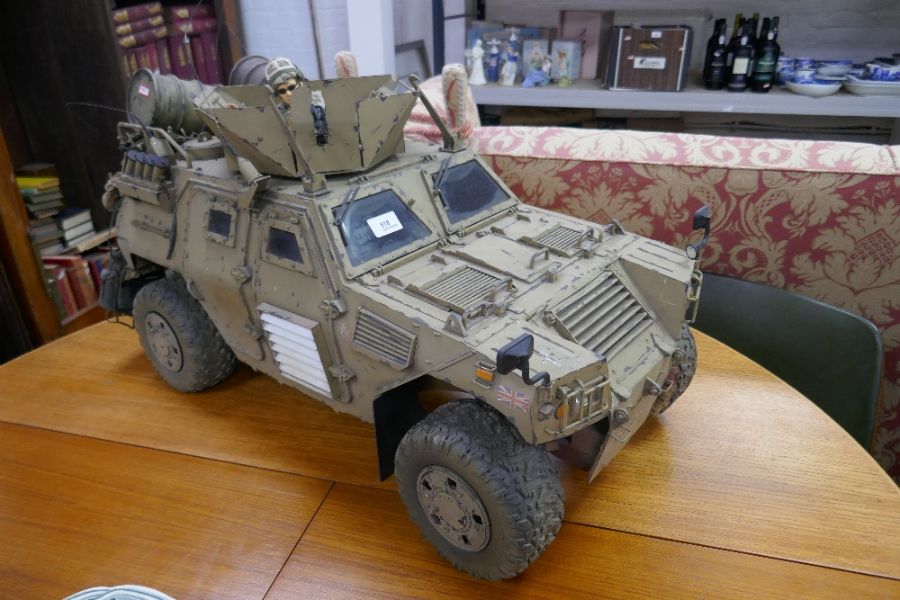 A remote control model of a British armoured vehicle modelled on Gulf War set up (highly de