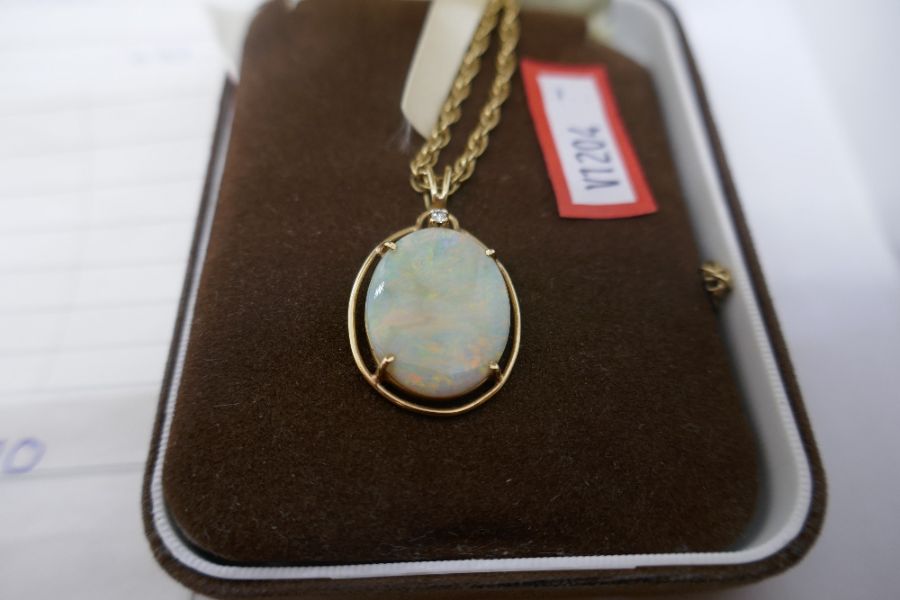 9ct yellow rope twist neckchain, marked 9ct, 7.8g hung with a 14K oval pendant with white opal and s - Image 2 of 8