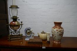 A Royal Worcester tea pot having leaf design lid with gilt decoration, a German figural mirror with