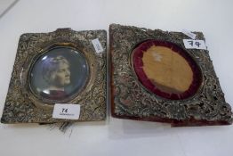 Two decorative silver pierced photoframes of square form, one hallmarked Birmingham 1900 Henry Matth