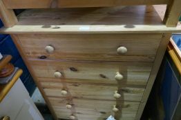 A pair of modern pine chests each having five drawers