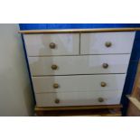 A modern cream painted two drawer wardrobe and modern chest of drawers
