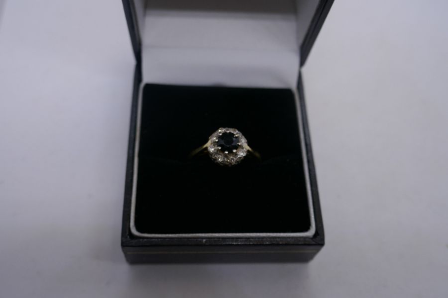 18ct Sapphire and diamond cluster ring, marked 8ct, size K/L, approx 3g