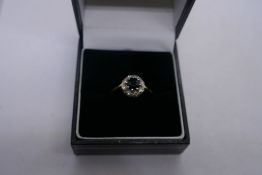18ct Sapphire and diamond cluster ring, marked 8ct, size K/L, approx 3g