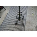 2 Similar wrought iron standard lamps and 1 other dog lamp