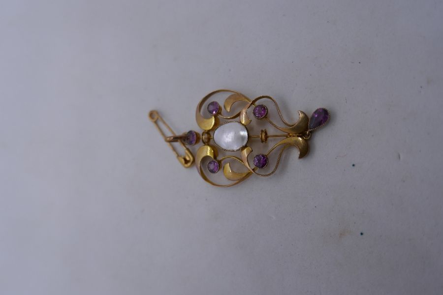 9ct yellow gold floral design pendant with central oval natural pearl, five round cut amethyst and h