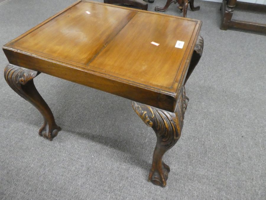 An early 20th century, mahogany stool having carved Cabriole legs on claw and ball feet