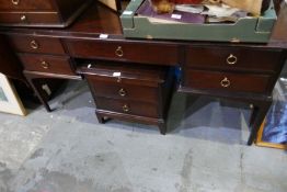 Stag Minstrel, a pair of bedside chests, a dressing table and a head board