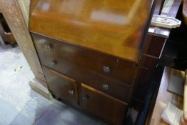 A reproduction console table and a bureau