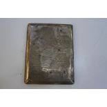 An interesting sterling silver cigarette case, with a map as decoration on the front, an