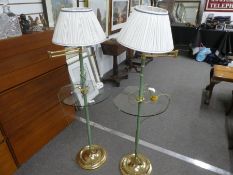 A pair of modern lamp tables, with adjustable arms