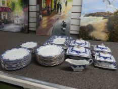 A quantity of napier blue & white dinner ware, including 5 graduated platters.