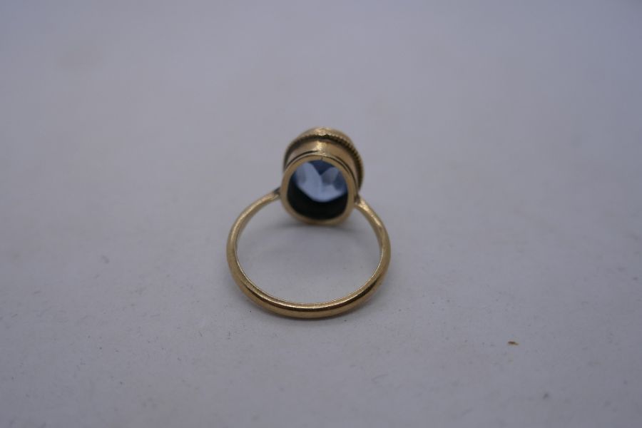 9ct yellow gold dress ring set with oval pale blue stone, marked 375, size R, 4.1g approx - Image 4 of 8