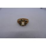 Gents 18ct yellow gold set with faceted yellow stone, possibly citrine, marked 18, approx 8.4g size