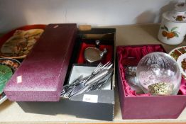 A selection of silver plated cutlery plus a selection of paperweights etc