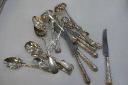 A quantity of various mixed cutlery to include silver spoons, a set of six silver handled knives, et