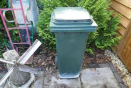 Green wheelie bin