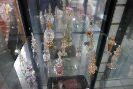 A Quantity of decorative miniature perfume bottles