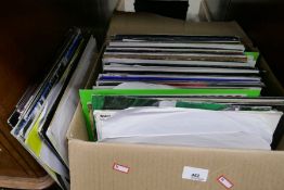 A box of vinyl modern Rap / Garage style music, mainly 12 inch singles, but some vinyl LPs