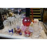 A pair of late Victorian clear glass lustres and other clear and coloured glass items