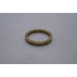 18ct yellow gold eternity ring set with clear stones, marked 18ct, size P 3.1g