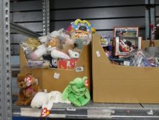 A shelf of vintage toys including model vehicles, Fisher Price garage, Happy Meal toys and Corgi toy